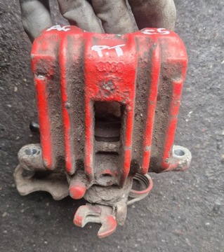 ZACISK HAMULCOWY PRAWY TYŁ AUDI A6 C5 2.4