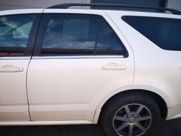 DVEŘE LEVÝ ZADNÍ CADILLAC SRX BÍLÉ