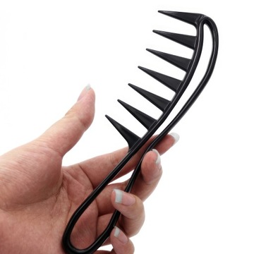 Широкая расческа для густых вьющихся волос.