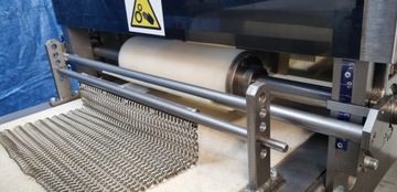 Насадка для хлеба KEMPER с лентой, вращающейся в противоположных направлениях.