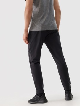 SPODNIE 4F MĘSKIE TRENINGOWE SZYBKOSCHNĄCE - CZARNE r. M