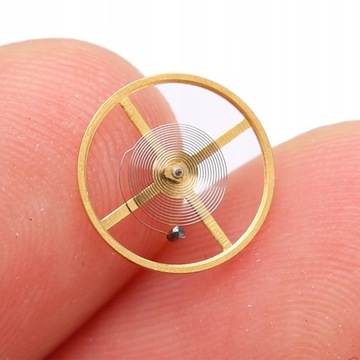 КОЛЕСО БАЛАНСА ЧАСОВ С ВОЛОСОВОЙ ПРУЖИНОЙ