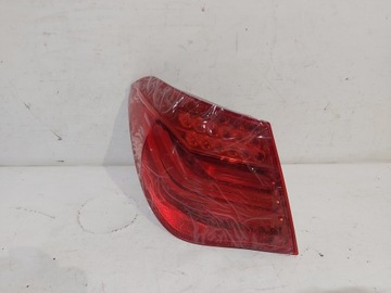 LAMPA LEWA TYŁ TYLNA W BŁOTNIK BMW 7 F01 NOWA ORG. 7182197