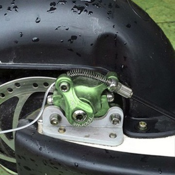 części zacisku hamulcowego do mini roweru dla dzieci lewy zielony