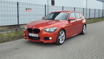 BMW Seria 1 F20-F21 Hatchback 5d 118i 170KM 2012 BMW Seria 1 Rudy niemiec z eM Pakietem 1.6 Benzyna 170KM, zdjęcie 2