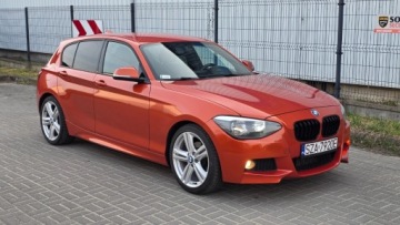 BMW Seria 1 F20-F21 Hatchback 5d 118i 170KM 2012 BMW Seria 1 Rudy niemiec z eM Pakietem 1.6 Benzyna 170KM, zdjęcie 1