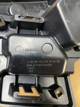 DRŽÁK MASKA PRAVÝ SKODA KAMIQ ORIG.