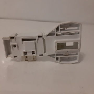 BLOKADA DRZWI PRALKI WHIRLPOOL INDESIT ROLD DM 066