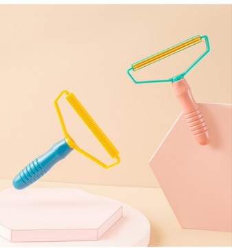 Щетка для бритвы, чтобы удалить волосы из одежды