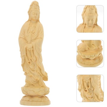 Украшение стола статуей богини Гуань Инь