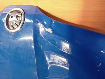 Крышка капота Skoda Rapid