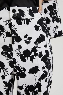 Garniturowe spodnie w kant czarno-białe XS od MOODO