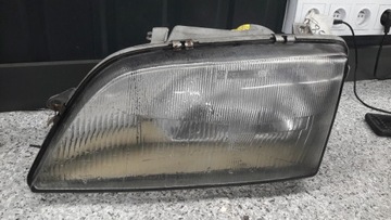 90213577 SVĚTLOMET LEVÝ OPEL OMEGA A