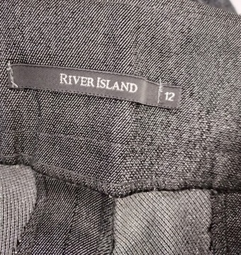 RIVER ISLAND srebrne spodnie z kantem 12/38