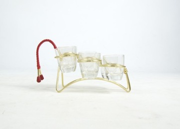 Набор очков на подставке, 1960-е и 1970-е годы.