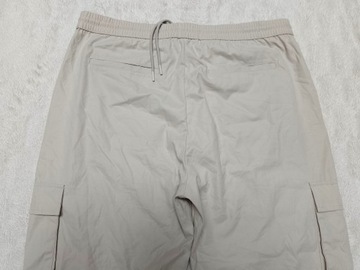 Spodnie materiałowe damskie H&M XL kremowe