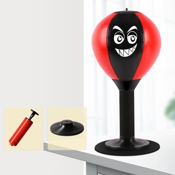 Тренировочный стол с тренировочным мячом красного цвета.