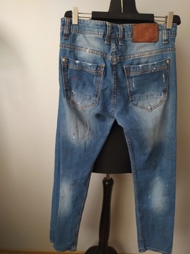 Dsquared2 spodnie jeansy dziury tarcia 33/34