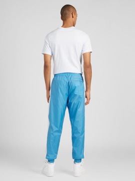Spodnie dresowe z lampasem, niebieski Nike M
