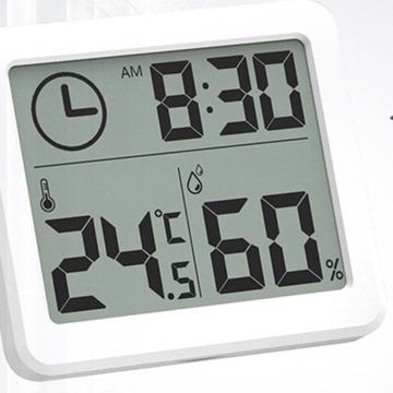 КОМНАТНЫЙ ТЕРМОМЕТР-ГИГРОМЕТР с цифровыми часами и измерением влажности.