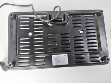 Электрическая нагревательная плита, состоящая из двух частей, с двойной регулировкой температуры.