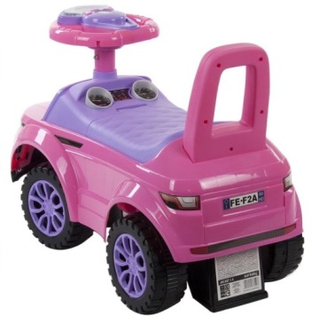 Каталка-качалка розового цвета для годовалого ребенка 12м+.