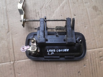 KLIKA LEVÝ PŘEDNÍ TOYOTA LAND CRUISER 90