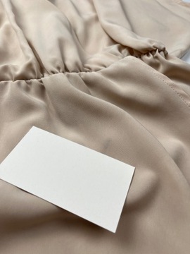 Kopertowa sukienka na krótki rękaw z gumką w talii kremowa mini H&M r. 38