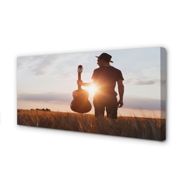 Foto obraz na płótnie Gitara człowiek 100x50 cm