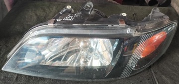 Mitsubishi Space Star I LIFT Reflektor lewy lampa