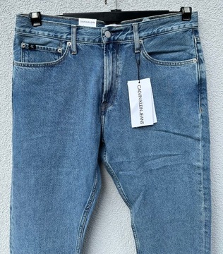 Calvin Klein Jeans CKJ035 W34 L32 spodnie jeansowe jasne niebieskie