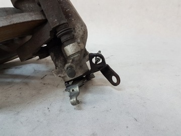 ZACISK HAMULCOWY LEWY PRAWY TYŁ TYLNY VW TOURAN I