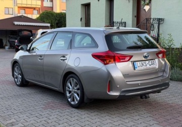 Toyota Auris II Touring Sports Hybrid 135 136KM 2013 Toyota Auris 1,8 HYBRID Navi Kamera KEY-LESS PDC Bezwypadkowy ASO Dla wyma, zdjęcie 5