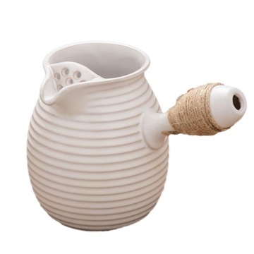 Porcelanowy dzbanek do herbaty z luźnymi liść