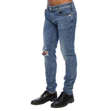 Spodnie DIESEL męskie jeansy rurki przecierane W29
