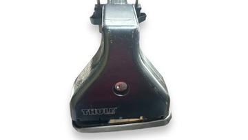 Багажник Thule на крышу с держателями для велосипедов.