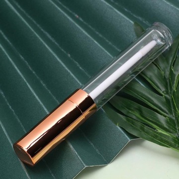 6 тюбиков блеска для губ, пустые упаковки.