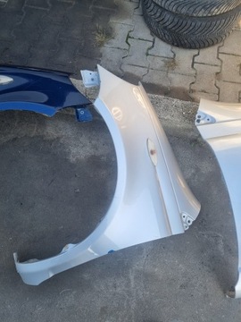 BLATNÍK LEVÝ PŘEDNÍ TOYOTA YARIS I