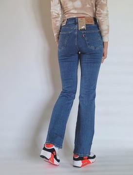 spodnie jeansowe LEVI'S 725 High Rise Bootcut W25 L30 XS dzwony