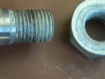 ОСЬ ПЕРЕДНЕГО КОЛЕСА 15 мм KAWASAKI KLR 650 C