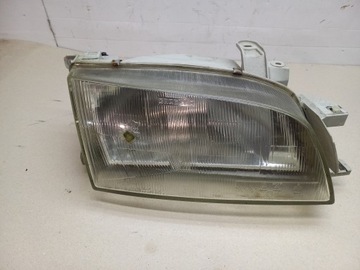 TOYOTA CARINA E 92-97 REFLEKTOR LAMPA PRZÓD PRAWA CARELLO