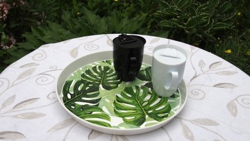 Круглый поднос 35 см с нанесенным на него миксом рисунков.