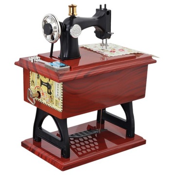Mechaniczna pozytywka w kształcie maszyny do szycia