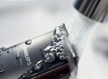 ВОДОНЕПРОНИЦАЕМЫЙ ТРИММЕР ДЛЯ БОРОДЫ И ЛИЦА PHILIPS + 2 гребня