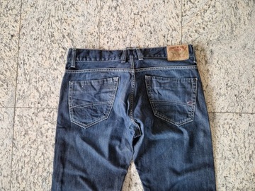 Tommy Hilfiger spodnie jeansy 34/32 ciemny granat PAS 94 cm