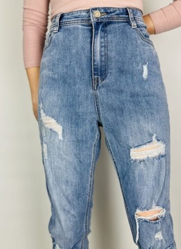 Jeansowe elastyczne spodnie rurki dziury XL 42 MissGuided