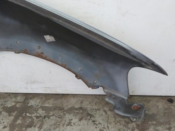 BLATNÍK LEVÝ PŘEDNÍ FORD MAVERICK