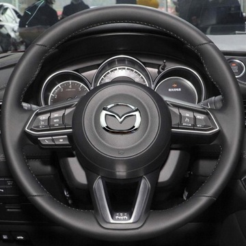 Наклейка с логотипом MAZDA на руль.