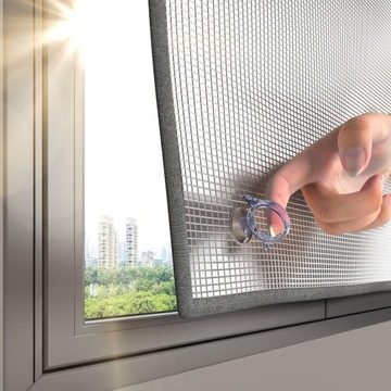 Двусторонняя оконная пленка, отражающая тепло и защищающая от солнца.