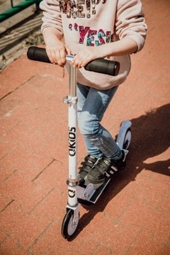 ДЕТСКИЙ СКЛАДНОЙ САМОКАТ QKIDS FLO PINK LEG ADJUSTMENT ABEC-7 50кг